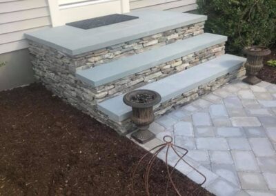 Stone stairs and granite steps by Stone Builders Masonry
