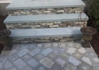 Stone stairs and granite steps by Stone Builders Masonry
